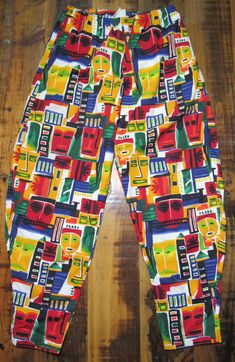 "Classic Vintage Parachute Pants by International Male. Great condition no stains or damage. Elastic in waist band works great. Size tag reads XL but vintage sizing varies, please check measurements below. Measurements: Waist: 15\" (elastic stretch waist) Inseam: 32\" Total Length: 43\"" Casual Multicolor Bottoms With Retro Print, Multicolor Casual Bottoms With Retro Print, Fun Multicolor Cotton Pants, Pantalon Parachute, Mc Hammer, Geometric Face, Classic Vintage, Waist Band, Size Tag