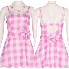 two mannequins dressed in pink and white checkered dresses with hearts on them