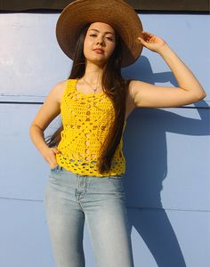 Vintage crochet tank top in yellow. Sleeveless. Scoop neckline. Size S, UK 6-10 / EU 34-38. Measurements- 34"(86cm) bust - 20"(51cm) top length. Material- Wool Condition - Excellent. Care - Handwash Cold Handpicked, repaired and ready to wear. This is an original vintage item, not new and minor signs of wear & age are expected, we will highlight any major flaws.Model is a UK 6/8 and is 5'7" tall Yellow Sleeveless Tank Top For Summer, Summer Scoop Neck Camisole For The Beach, Fitted Yellow Camisole For The Beach, Summer Crochet Lace Cami Top, Summer Cami Crochet Top With Crochet Lace, Casual Yellow Crochet Lace Top, Yellow Crochet Lace Top For Summer, Yellow Sleeveless Crochet Lace Top, Fitted Crochet Lace Sleeveless Tank Top