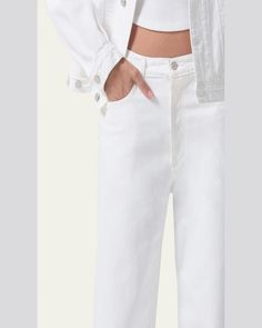 AGOLDE wideleg jeans in white nonstretch denim     Fivepocket style    Low rise    Relaxed, baggy fit    Full length    Button/zip fly; belt loops    Cotton    Imported Modern White Cropped Leg Bottoms, White Wide Leg Summer Pants With Belt Loops, White Wide Leg Pants With Belt Loops For Summer, Modern High Rise White Pants, White Cropped Leg Modern Bottoms, Modern White Pants With Five Pockets, Chic White Pants With Five Pockets, White High Rise Wide Leg Cotton Pants, White Wide Leg Flare Jeans With Five Pockets