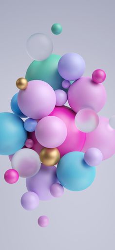 colorful balloons floating in the air on a gray background