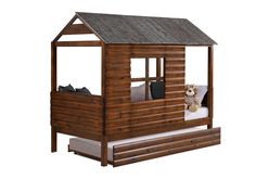 a small wooden cabin bed with a loft