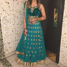 This Beautiful Outfit Has A Velvet Crop Top & Mesh Veil, Only Worn Once. Alterations Can Be Made! Embellished Green Dress For Navratri, Green Embellished Anarkali Set For Party, Embellished Green Anarkali Set For Party, Green Bollywood Anarkali Set For Formal Occasions, Formal Green Lehenga For Eid, Green Anarkali Set With Traditional Drape For Formal Occasions, Green Anarkali Set For Formal Occasions With Traditional Drape, Green Semi-stitched Lehenga For Formal Occasions, Semi-stitched Green Lehenga For Formal Occasions