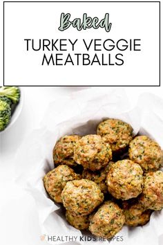 baked turkey veggie meatballs in a bowl with broccoli on the side