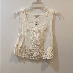 Embroidered White Crop Top Size: Small New With Tag! Casual Embroidered Top With Lace Trim For Summer, Summer Embroidered Lace Top With Lace Trim, Casual Embroidered Top With Intricate Embroidery For Spring, Casual Summer Tops With Intricate Embroidery, Casual Tops With Intricate Embroidery For Summer, Bohemian Embroidered Lace Top For Summer, Casual Fitted Embroidered Top With Intricate Embroidery, Fitted Casual Top With Intricate Embroidery, Fitted Casual Embroidered Top With Intricate Embroidery