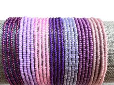 Seed Bead Stretch Bracelet Stretch Stacking Bracelets Purple Beaded Stackable Friendship Bracelets Purchase singles and multiples to create your own unique look.  * Listing is for a single bracelet  * Made from glass seed beads from around the world* * Tiny glass seed beads (approximately 2-3mm size 11) * Available in multiple sizes-please measure accordingly  * Strung on durable beading elastic. 🦋 BUILD A STACK Purchase bracelets from this collection and our other collections for a look that is unique to you  Find your way back to our shop easily- etsy.me/3LI3MvW 🦋 FOLLOW US ON INSTAGRAM     @stonesandpaper     That is where the party is at!     We offer sneak peeks of new products, behind the scenes, and the occasional discount exclusively for      our followers 🦋 ORDER FULFILLMENT  * Handmade Packaging, Seed Bead Bracelets, Beaded Stretch Bracelet, Colorful Bracelets, Bracelet Stack, Shades Of Purple, Stretch Bracelets, Bracelet Making, Friendship Bracelets