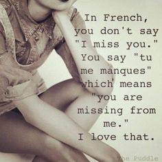 a woman sitting on top of a white floor next to a quote that says, in french, you don't say i miss you