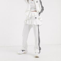 Regular Fit Is Not Tight And Not Loose, The Perfect In-Between Fit Open Hems 79% Cotton / 21% Recycled Polyester Velour Side Zip Pocket; Elastic Waist Double-Layer Satin Frill Sweatpants Adidas Women, Adidas Sweats Women, Adidas White Track Pants, Adidas Track Pants Winter, Adidas Popper Pants, Adidas Tracksuit Bottoms Women, Womens Adidas Sweatpants, Swishy Nylon Adidas Pants, Kardashians Adidas