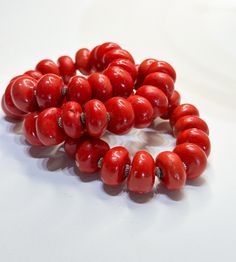 Handmade by Attrice featuring Cherry Red Moroccan Resin Beads.  Bracelets are sold as individual pieces. Some images show multiple bracelets for styling tips. #treciesshoppe   #festiveetsyfinds   #statementjewelry #beadedbracelets #bracelets #menstyle #styleinspiration #style #statebracelets#ethnicjewelry  #tribaljewelry #jotd #etsyhandmade #etsysuccess #bohemian #africanbeads #woodbeads #summerstyle #brunchfashion #braceletsformen #braceletsforwomen #unisexjewelry #jewelry #bracelets #handmadej Brunch Fashion, Multiple Bracelets, Wood Bead Bracelet, Etsy Success, Turquoise Accents, Beads Bracelets, Stylish Bracelet, Bone Beads, Agate Bracelet