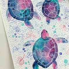 two watercolor sea turtles swimming in the ocean with bubbles and stars on their back