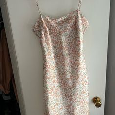 Urban Outfitters Floral Slip Dress. Never Been Worn. White Floral Dress With Spaghetti Straps For Spring, Casual White Floral Dress With Spaghetti Straps, White Fitted Floral Dress With Spaghetti Straps, White Floral Dress With Spaghetti Straps For Garden Party, White Floral Dress With Spaghetti Straps For Brunch, White Lined Sundress For Garden Party, White Floral Spaghetti Strap Dress, White Floral Dress With Spaghetti Straps For Day Out, White Fitted Sundress By Urban Outfitters