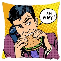 a man eating a hamburger and talking on the phone with an expression bubble above his head