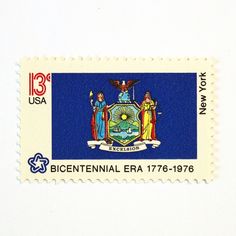 a stamp with an image of the state of new york on it's front