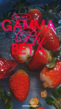 some strawberries are sitting in a bowl with the words gammya on it