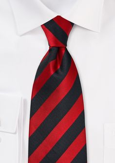 Introducing our Deep Red and Black Repp&Regimental Striped Necktie, a captivating accessory that exudes timeless elegance and a touch of bold sophistication. The deep red and sleek black stripes create a visually striking pattern that adds a distinctive flair to any ensemble. Whether you're shopping for men's suits or preparing for a wedding, this necktie is a must-have for those who appreciate refined style with a modern twist. Pair it with a classic tuxedo to exude an air of timeless charm, or Black Suit With Red Tie, Suit Red Tie, Suit With Red Tie, Pin Stripe Suit, Regimental Stripe, Stripe Suit, Classic Tuxedo, Men's Ties, Mens Holiday