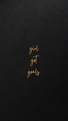 a black book with gold writing on the front and back cover that says, girl got goals