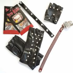 6 Piece Biker/Punk Halloween Costume Set. Includes: 1 Pair Of 10" Fingerless Gloves, 1(One) 4" Fingerless Glove, 2 Unused Tattoo Sleeves, 1 (Unused With Tag)14" Red Studded Collar With Snap And 1 Black Collar With Plastic Spikes (This Collar Is Missing A Piece So It Cannot Close. It Has Three Snaps But All Are The Same. You Must Use Safety Pin Or Some Other Method To Wear It) Punk Black Costume Accessories For Winter, Punk Style Black Costume Accessories For Winter, Punk Halloween Costume, Punk Halloween, Studded Collar, Tattoo Sleeves, Red Studs, Holiday Colors, Safety Pin