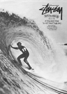 a man riding a wave on top of a surfboard