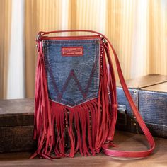 Red In Color Pu Leather Zipper Lining Leather Wrangler Pocket Crossbody Purse For Western Lifestyle. Boho Fringe Cross Body Purse Adopts The Signature Wrangler Jeans Hip-Pocket. Western Purse Is Crafted From A Denim And Vegan Leather Body, 100% Genuine Leather Fringe Crossbody Bag Measures 0.5"D X 7"W X 8.2"H (Adjustable Strap: 22"-25.5" Drop). Country Purse Includes A Side Zippered Pocket And An Open Pocket, A Zippered Pocket On The Back. As Always, I Ship Out The Same Or Next Day :) New To Pos Restyle Old Clothes, Fringe Handbags Purses, Upcycle Denim, Fringe Crossbody Purse, Leather Fringe Purse, Hip Purse, Embellished Purses, Denim Fringe, Leather Designs