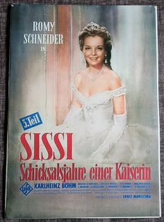 the front cover of a magazine with an image of a woman wearing a tiara