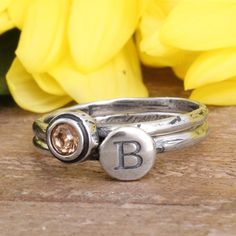 "This set of two stackable rings can represent the initial and birthstone of your child or any loved one. This also makes a great gift for graduation or a birthday. Or, wear your own birthstone and initial! Add to this ring over time by stacking more bands. Give the gift of this perfect mother's or grandmother's stacking ring set! Need more than 2 rings in your set? Create your own stack here: https://www.etsy.com/listing/230740149 These rings are also available in GOLD: https://www.etsy.com/lis Ring Set Silver, Stackable Birthstone Rings, Ring Initial, Mother's Ring, Birthstone Stacking Rings, Gift For Graduation, Stack Rings, Multiple Rings, Family Rings