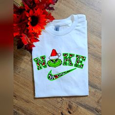 Super Cute Tee. On Gildan Adult Unisex White Tee Shirt. Made With Sublimation. Ships Within 3 Business Days. Grinch Day, Nike Christmas, Cute Grinch, White Tee Shirt, Christmas Grinch, Popular Shirt, White Tee Shirts, White Tee, Grinch