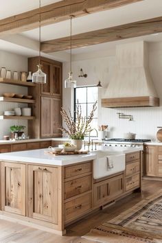 a large kitchen with wooden cabinets and white counter tops, along with an area rug on the floor