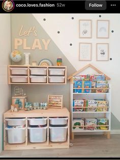 a child's play room with toys and bookshelves on the wall next to it