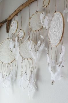 the dream catchers are hanging on the wall