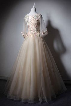 Tulle Wedding Dress With Sheer Bodice For Banquets, Floor-length Tulle Wedding Dress With Illusion Neckline, Tulle Evening Dress With Illusion Neckline For Banquet, Tulle Wedding Dress For Prom Season Banquet, Tulle Wedding Dress For Banquet Or Prom, Wedding Evening Dress With Illusion Neckline And Tulle, Formal Tulle Ball Gown With Illusion Neckline, Tulle Evening Dress With Illusion Neckline, Floor-length Tulle Evening Dress With Illusion Neckline