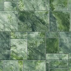 a green tile wall that looks like it is made out of marble