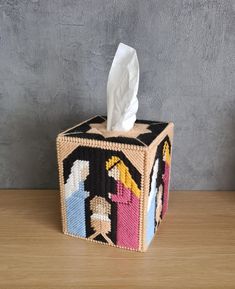 a tissue dispenser made out of woven material