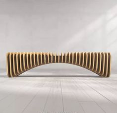 a wooden bench sitting on top of a white floor