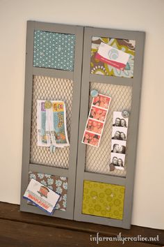 an old door is decorated with pictures and magnets