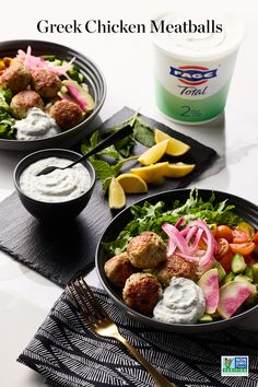 two bowls filled with meatballs and salad next to a cup of yogurt