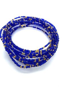 Sparkly Blue and Gold waist beads! Gorgeous on any skin tone! These waist beads have metallic clasps.Waist beads, African waist beads, Belly Chain, Belly Beads**** PROPERLY MEASURE YOUR WAIST ****Place the measuring tape at the exact area you prefer to wear the waist beads.Do not tuck in your stomach when measuring for belly chain.Allow for wiggle space when measuring for breathing room.Thank you for shopping with us! Blue Waist Beads, Waist Beads Ideas, Gold Waist Beads, Waist Beads African, Beads Waist, Belly Beads, African Waist Beads, Waist Jewelry, Breathing Room