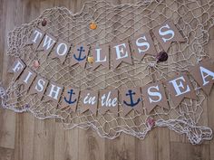 there is a net with words on it that say two less fish in the sea