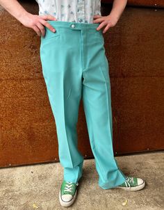 "Classic bright seamfoam blue-green polyester golf pants. Sansa-belt branding with adjustable tabs at side seams on the waistband. Tab over closure. Polyester double knit , some slight stretch. Jet front pockets, welt back pockets. The waistband sits higher on the waist than current pants, so the fit will be different, please see photos.  Great vintage condition. Measured flat in inches Waist 38\" Inseam 33\" Rise 13\" Thigh 26 Leg opening 22\" *My very dear friends across the Sea-there have bee Retro Wide Leg Bottoms, Vintage Full Length Bottoms For Spring, Spring Pants With Belt Loops And Standard Cut Leg, 1970s Style Wide Leg Pants For Summer, 1970s Style Wide Leg Summer Pants, Retro Straight Leg Summer Pants, Retro Full Length Summer Bottoms, Retro Fitted Straight Pants, Fitted Summer Pants With Standard Cut Leg