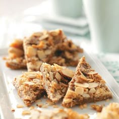 several pieces of granola on a white plate