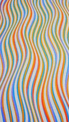 an image of colorful wavy lines on fabric