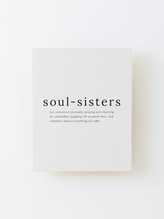 a white square with the words soul sisters on it in black lettering, against a white background