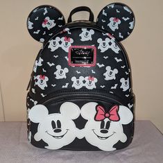 Nwt Loungefly Disney Mickey And Minnie Mouse Halloween Glow In The Dark Mini Backpack Only Bubble Wrapped, Boxed Pet Free And Smoke Free Home Polyurethane; Polyester Lining Approx. 8"" W X 10"" H X 5"" D #Loungefly Disney Halloween Backpack Second Image Shows The Glow In The Dark Features Loungefly Halloween Glow In The Dark Backpack Cute Black Mickey Mouse Backpack, Black Minnie Mouse Standard Backpack, Black Minnie Mouse Backpack For Everyday Use, Black Minnie Mouse Backpack For Back To School, Black Minnie Mouse Bag For Back To School, Back To School Minnie Mouse Black Backpack, Cute Black Minnie Mouse Backpack, Black Mickey Mouse Backpack For Disney Fan Events, Loungefly Halloween