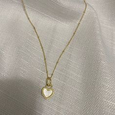 Gold Pendant Necklace, Gold Chain Choker, Heart Charm Necklace, Gold C – Juniper Trendy Gold Plated Heart Charm Necklace, Trendy Heart-shaped Chain Necklace As Gift, Trendy Gold Plated Heart Necklace With Heart Charm, Trendy Gold Plated Heart Necklace, White Clavicle Chain Necklace For Valentine's Day, Everyday Heart-shaped Chain Necklace, White Heart Pendant Necklace With Clavicle Chain, Trendy Gold Jewelry With Heart Print, White Chain Necklace For Valentine's Day Gift