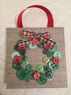 a bag with buttons and a bow on it