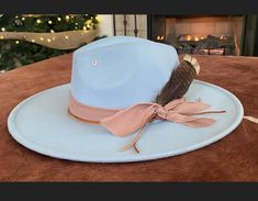 Blue Skies- light blue hat adorned with ribbon and a large turkey feather! Adorable hat! One size fits most! Hand wash only, lint brush for dusting Lsu Game, Mens Hats Fashion, Womens Hats, Lint Brush, Mens Hats, Hats Fashion, Chapeau Cowboy, Women Hat, Turkey Feathers