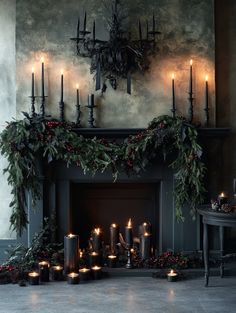 u1942658271_Dark_green_holiday_garlands_draped_over_a_firepla_c46ee80a-d470-410e-8382-c607ecbed3e6_0 Dark Romantic Christmas, Dark Moody Christmas Aesthetic, Dark Yule Christmas, Dark And Moody Christmas Decor, Diy Dark Christmas Decorations, Magical Christmas Decor, Dark Moody Christmas Decor, Christmas Aesthetic Dark, Spooky Christmas Aesthetic