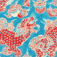 a blue and red dragon pattern on fabric