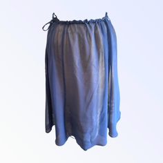 Best Seller - Tie Waist Overskirt in Indigo silk chiffon. Skirt is very versatile and can be worn over a slip, leggings, bathing suit, etc., or wear it as a slip. Pair it with one of our tops for a seamless dressed up look. Now available in Ivory, Indigo, Cloud Blue, Pistachio and Vintage Rose. One Size fits most. - princess seams - drawstring ties To prevent shrinkage, hand wash in cold water, hang to dry, or dry cleaning is recommended. Please email for additional information and before placin Spring Sheer Stretch Skirt, Summer Nylon Skirt, Silk Bottoms For Spring Daywear, Spring Silk Bottoms For Daywear, Summer Full Skirt For Daywear, Spring Full Nylon Skirt, Spring Long Nylon Skirt, Nylon Full Skirt For Spring, Spring Nylon Long Skirt