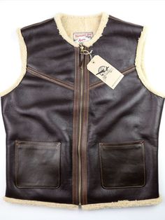 The Aero Outlaw Vest looks rugged, but it has a incredibly soft curly shearling interior that will keep you toasty as the days and nights get colder! If you are ready to get fitted for an Outlaw Vest, or any other Aero style, contact us at sales@thurston-bros.com to start the process!

https://www.thurston-bros.com/pages/custom-aero Shearling Vests, Aero Leather Jacket, Vest Looks, Shearling Vest, Leather Gear, Leather Vest, Leather Fashion, Get Fit