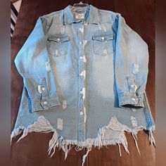 American Bazi Long Destructed Hem Denim Jacket For Women Light Blue Denim Size 2x New! Never Worn Or Washed. No Tags, But Buttons Still Have Protective Paper On Them. This Is A Heavy Denim. Ripped Long Sleeve Denim Jacket For Spring, Spring Ripped Long Sleeve Denim Jacket, Medium Wash Ripped Long Sleeve Outerwear, Ripped Long Sleeve Medium Wash Outerwear, Ripped Medium Wash Long Sleeve Outerwear, Trendy Long-sleeved Distressed Denim Jacket, Trendy Long Sleeve Distressed Denim Jacket, Casual Long Sleeve Distressed Denim Jacket, Oversized Distressed Medium Wash Denim Top